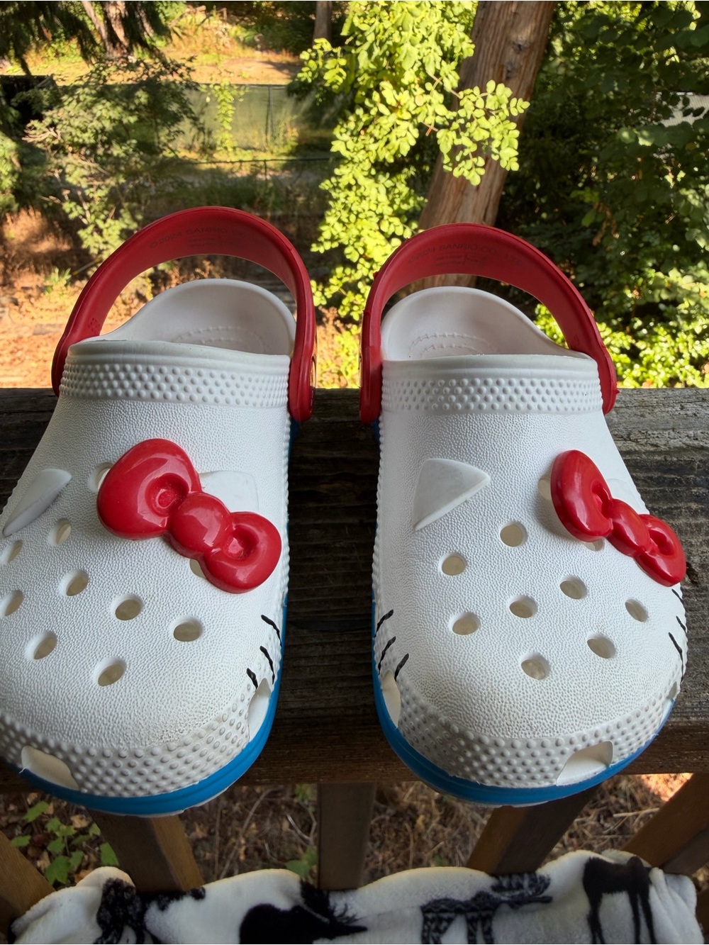 CROCS White Kids Clog Sandals with Red Bow and Blue Soles